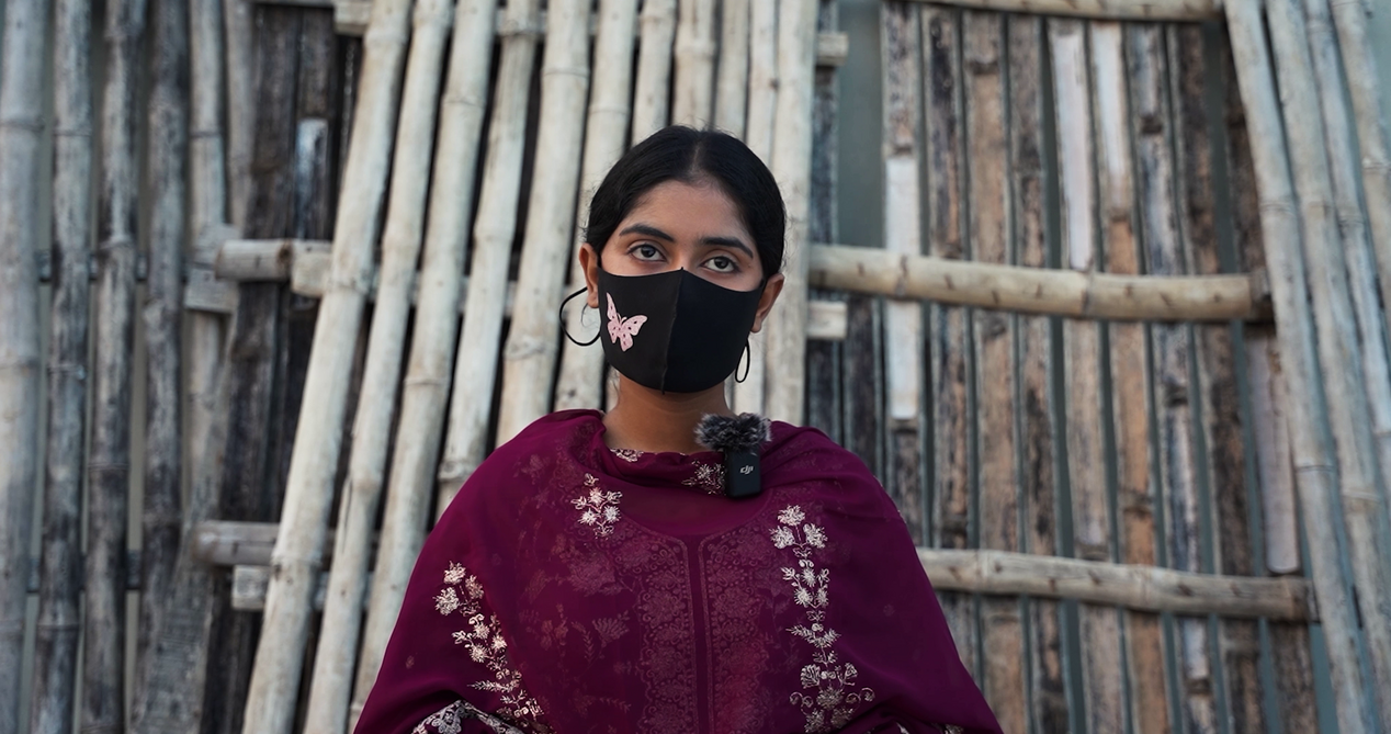 Photo of an interviewee. Due to the social stigmatization of menstruation, one interviewee covers her face with a mask as she talks about problems during her period.