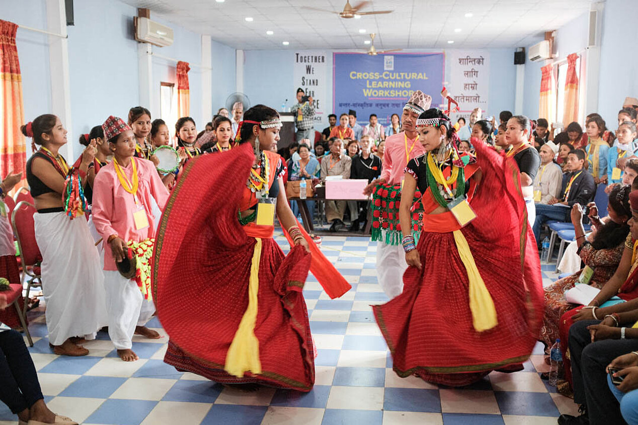 Dancers with traditional clothes of the Tharu in Nepal